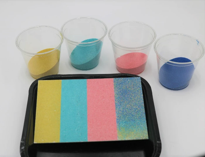 It's easy to create mess-free sand art with adhesive boards.